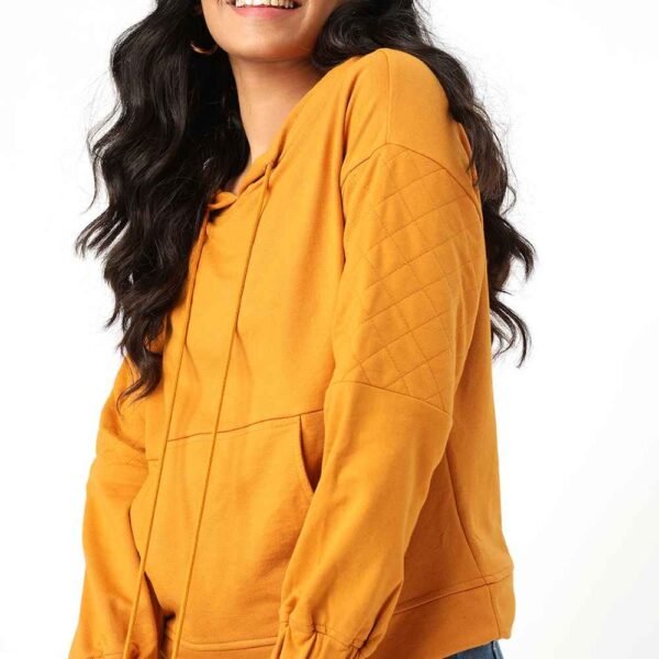 Custom cotton fleece hoodie for women, offered in various colors for bulk orders.