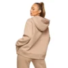 Side view of a fitted Women’s Cotton Fleece Tracksuit showcasing sleek and modern tailoring