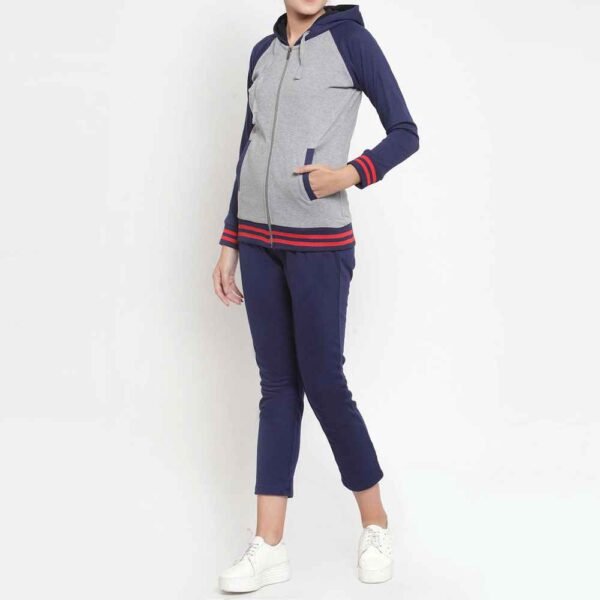 Women zip-up fleece tracksuit set with sleek jacket and pants, crafted for both style and comfort.