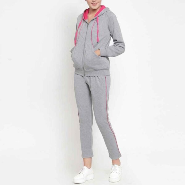 Women fleece tracksuit with a zip-up jacket and coordinating pants, designed for comfort and everyday use.