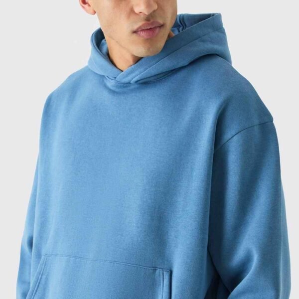 Close-up of a men’s cotton fleece tracksuit showcasing its soft fabric and sleek design.