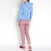 Side view of women fleece tracksuit featuring a zip-up jacket and matching pants, offering a sleek and comfortable fit.