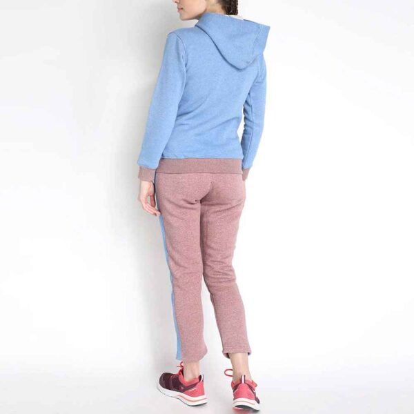 Side view of women fleece tracksuit featuring a zip-up jacket and matching pants, offering a sleek and comfortable fit.