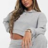Soft and stylish women’s Terry fleece tracksuit offering tailored comfort and a sleek design.