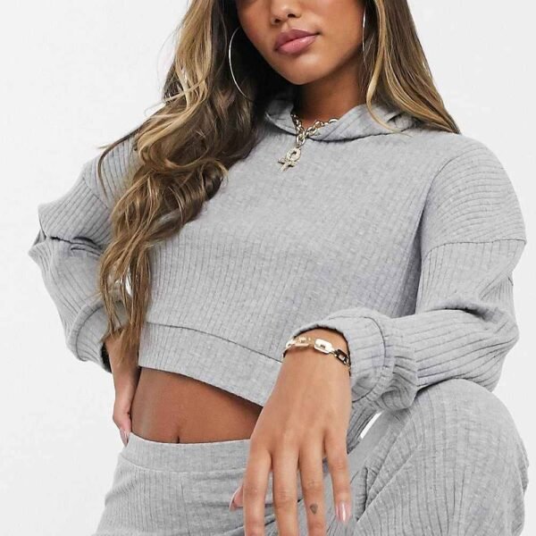 Soft and stylish women’s Terry fleece tracksuit offering tailored comfort and a sleek design.