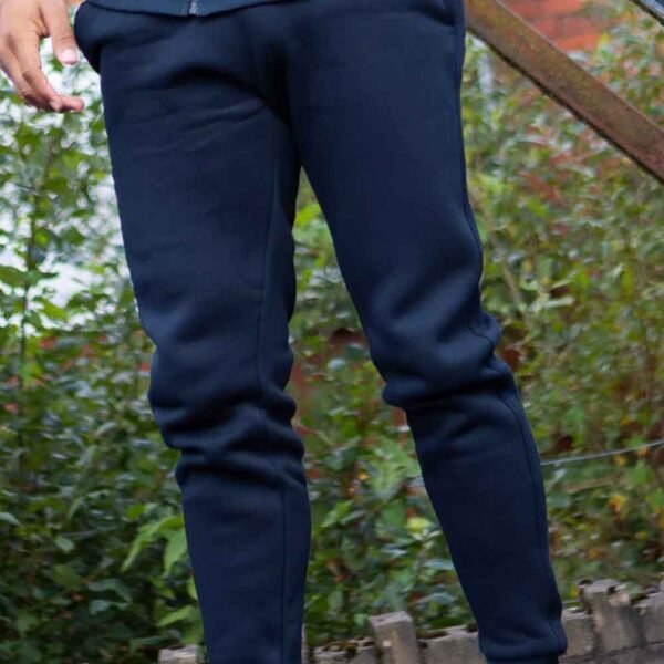 Detailed view of the men’s tracksuit highlighting its comfortable and stylish construction.