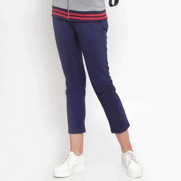 Full-body shot of a women fleece tracksuit with zip-up jacket and pants, designed for both comfort and style.