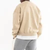 Close-up of Organic Cotton Fleece material, highlighting breathable and sustainable texture