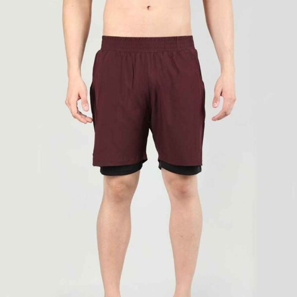 Soft cotton men’s sweatshorts laid flat to highlight fabric texture and design details.