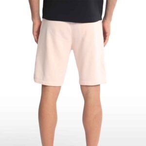 Front view of men’s cotton sweatshorts in classic fit, displayed on model against white background.