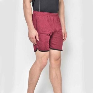 Angled view of men’s cotton shorts, revealing drawstring and side seam detailing.