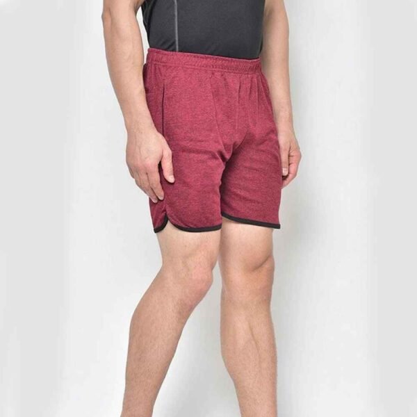 Angled view of men’s cotton shorts, revealing drawstring and side seam detailing.