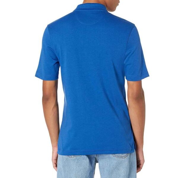 Relaxed fit pique cotton polo shirt on male model, designed for comfort and casual use.