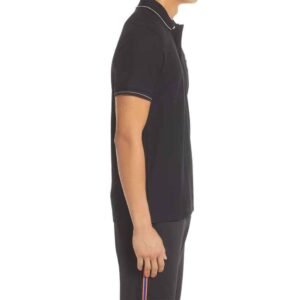 Everyday casual outfit with a soft pique cotton polo shirt worn by a male model.