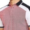 Side profile shot in gallery highlighting the fit and fabric texture of a men’s polo shirt.